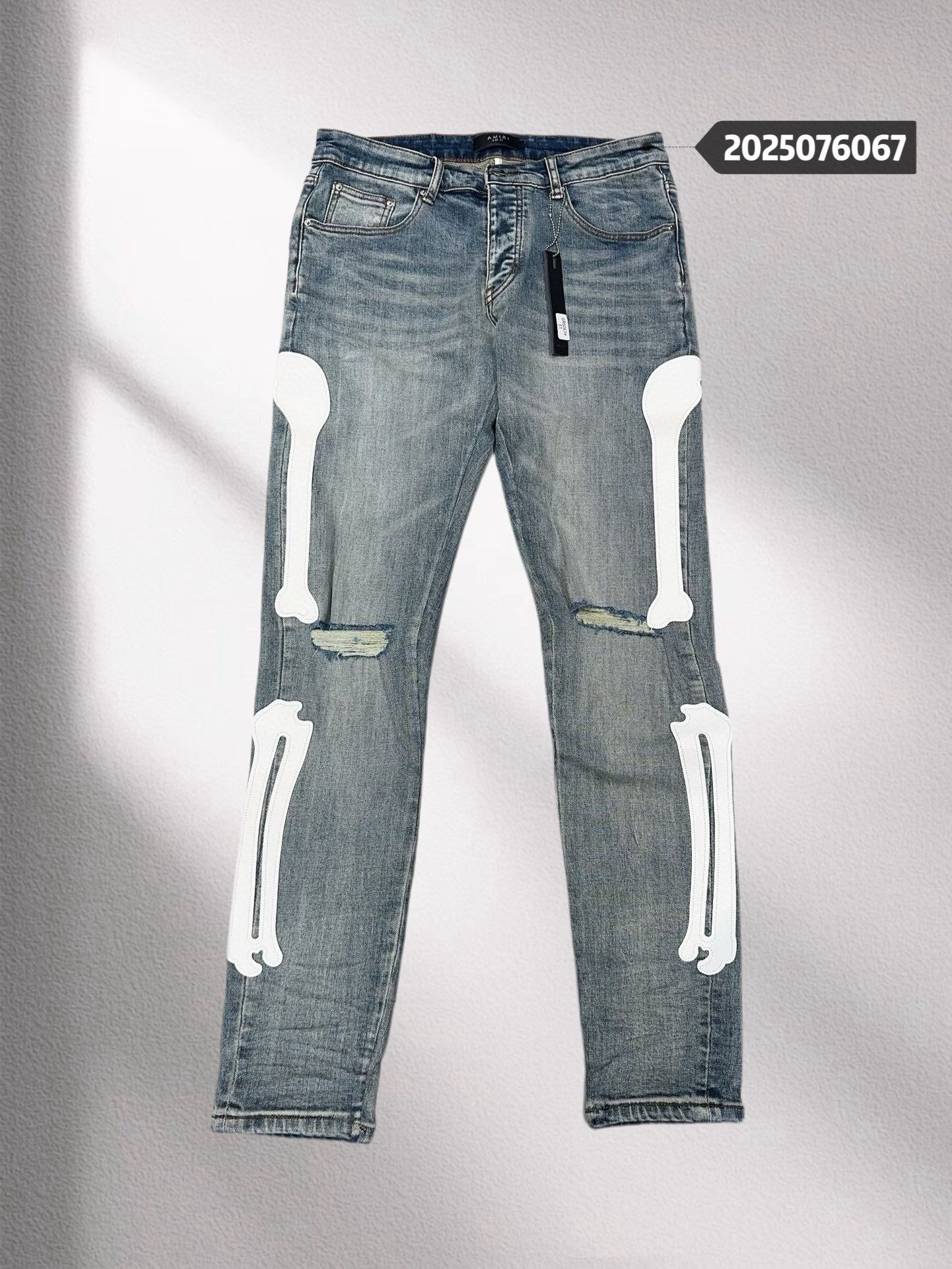 Amir Bones Skinny-Fit Appliquéd Distressed Jeans